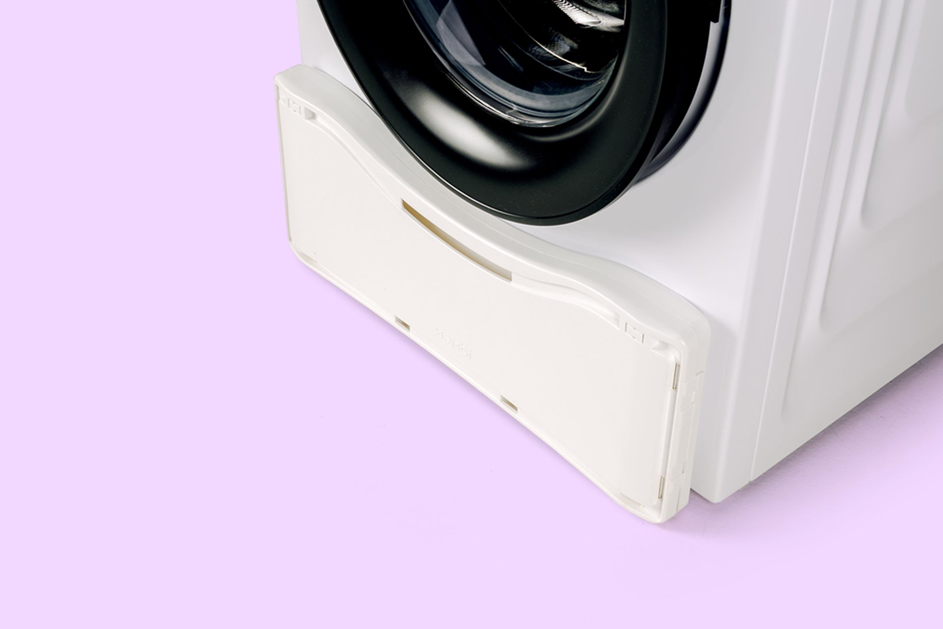 Panier a linge range contre la machine a laver