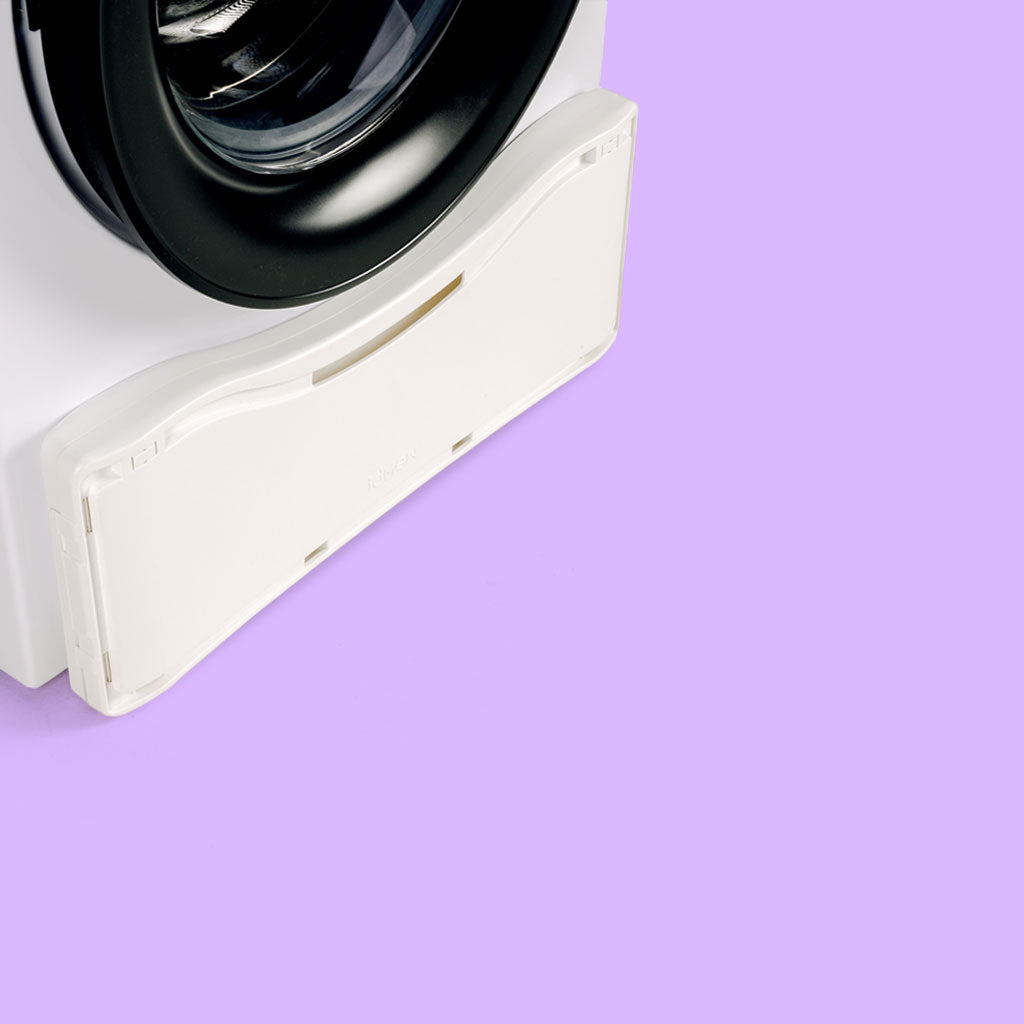 Panier a linge range contre la machine a laver