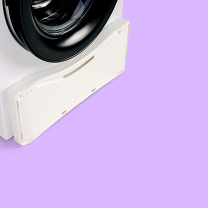 Panier a linge range contre la machine a laver